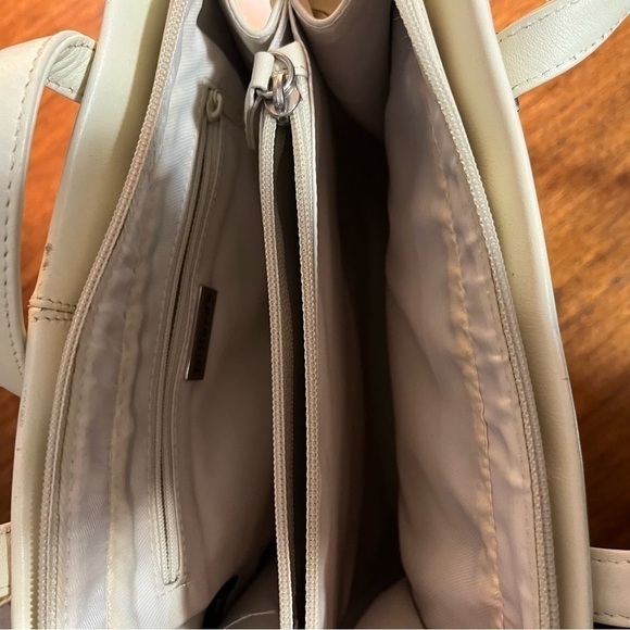 Dillards vintage Leather Ivory Purse
Perforated Diamond Pattern - Picture 9 of 13